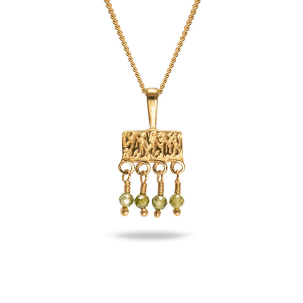 gold embossed pendant necklace with green dangly wire wrapped beads