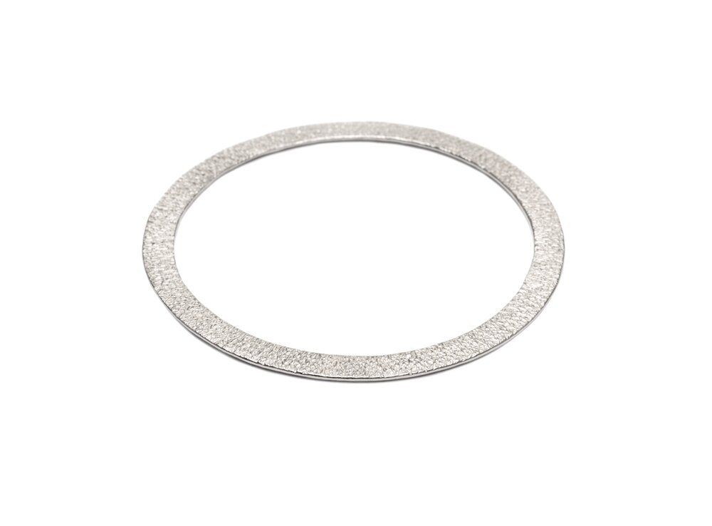 silver embossed flat bangle at IndependentBoutique.com