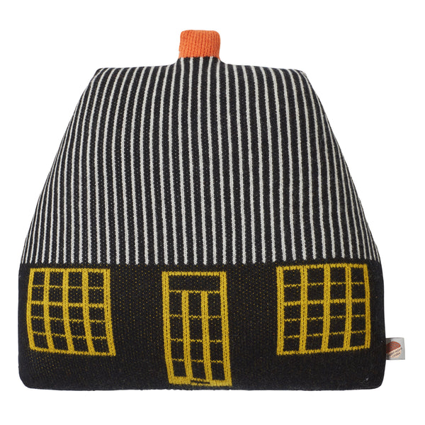Donna Wilson knitted black cottage cushion with yellow windows and striped white roof 