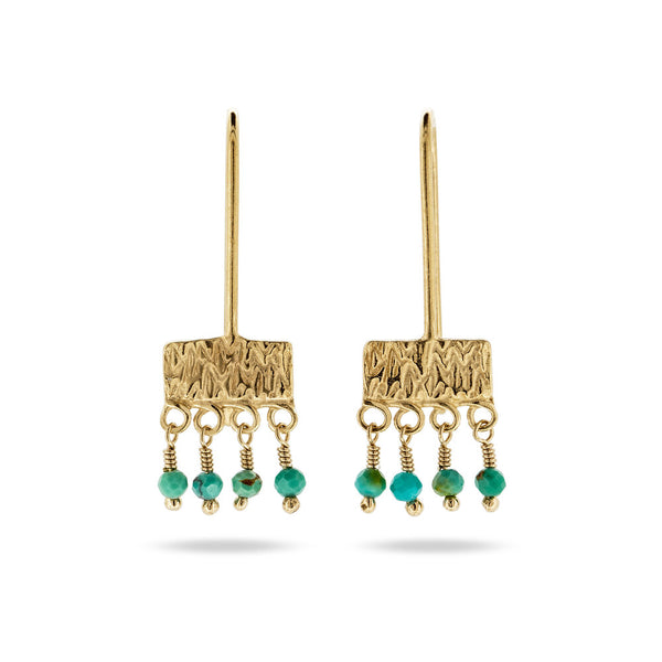 gold embossed earrings with dangly turquoise beads at IndependentBoutique.com