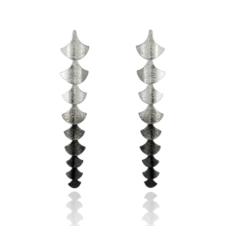 Silver dangly earrings in teardrop shapes