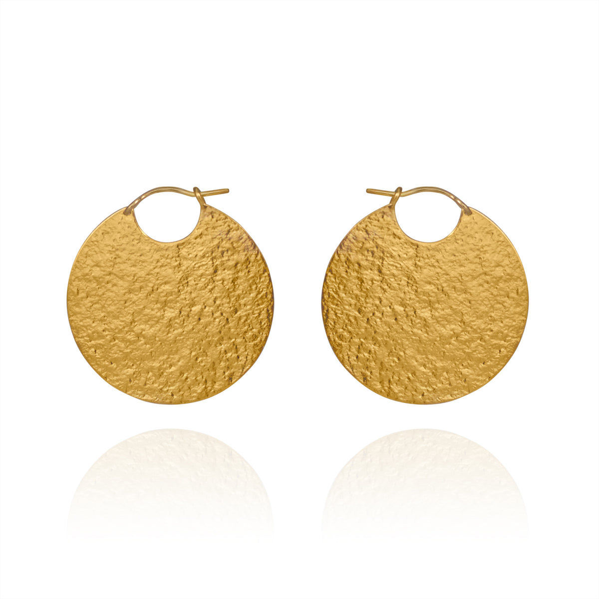 Large gold disc hoop style earrings with textured finish.