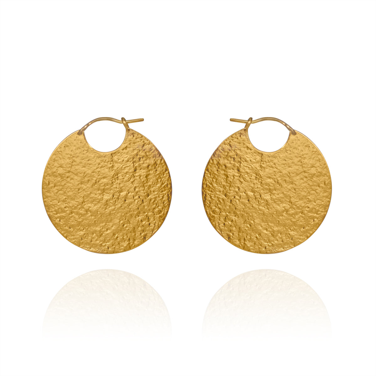 Large gold disc hoop style earrings with textured finish.