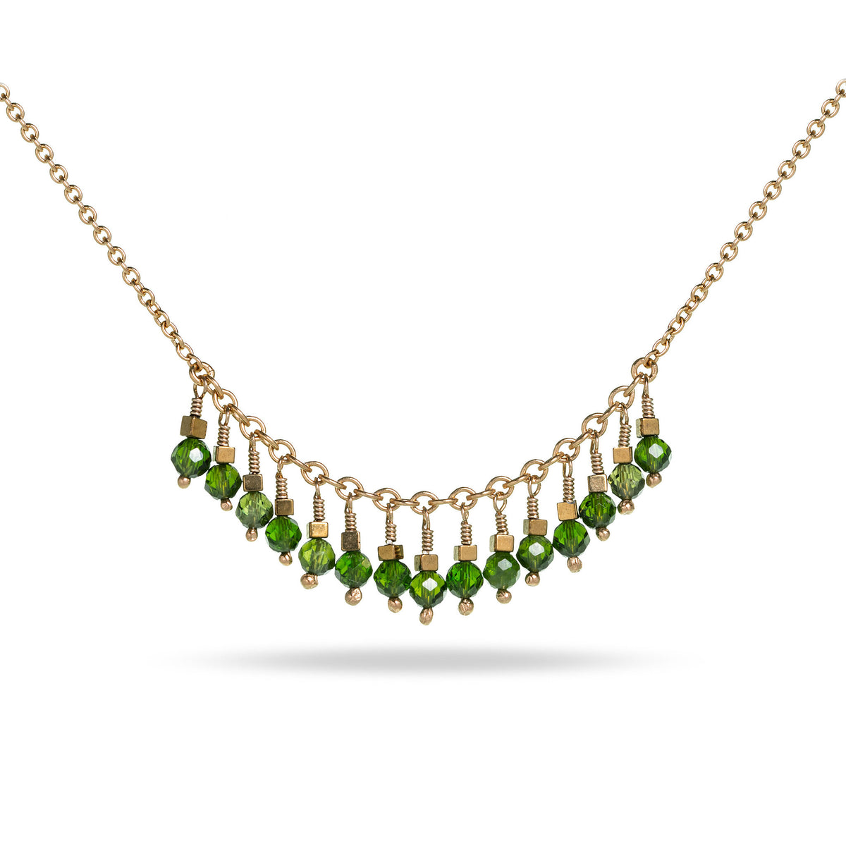 gold necklace with green stone dangly beads and tiny gold square beads at IndependentBoutique.com