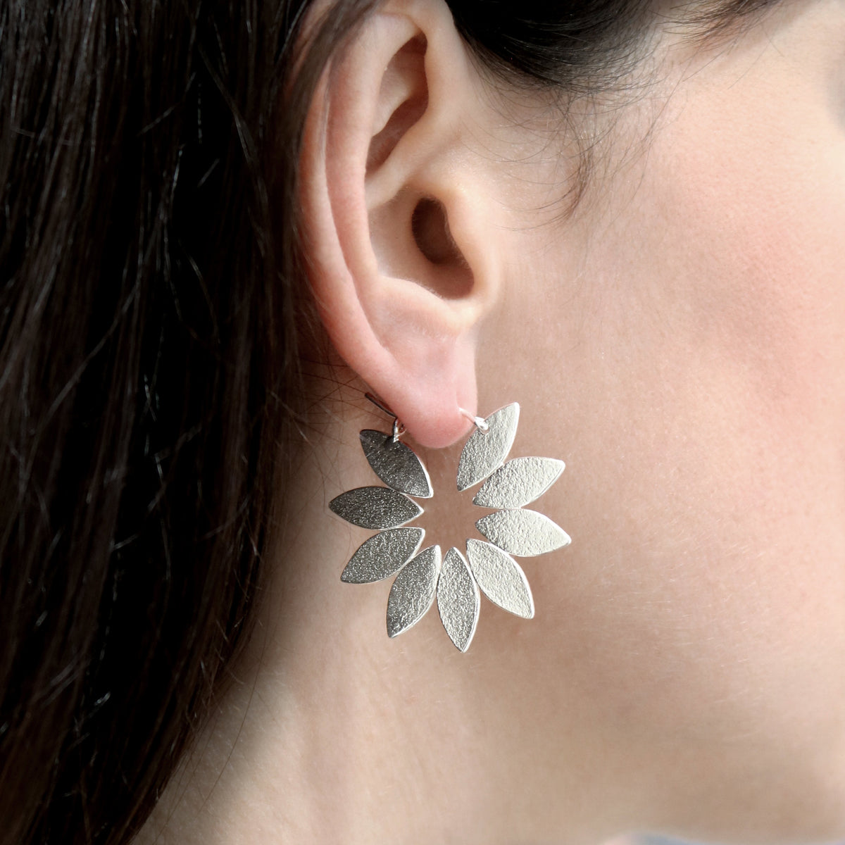 Silver Icarus Fanned Hoop Earrings on model by Cara Tonkin