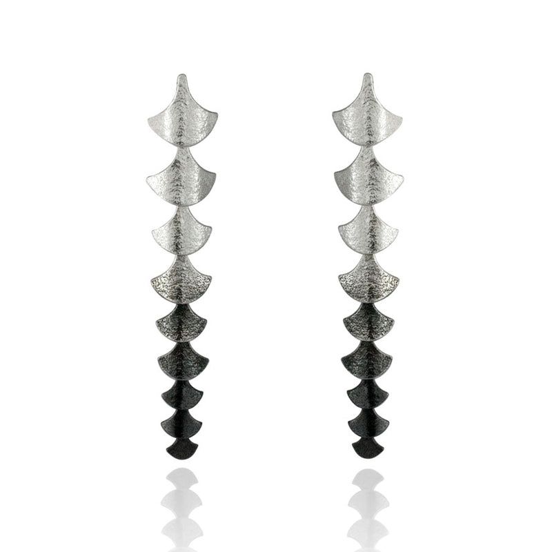 Silver dangly earrings in teardrop shapes