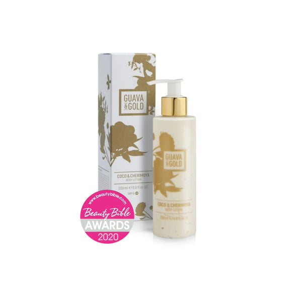 white and gold printed bottle and box of body lotion by Guava and Gold