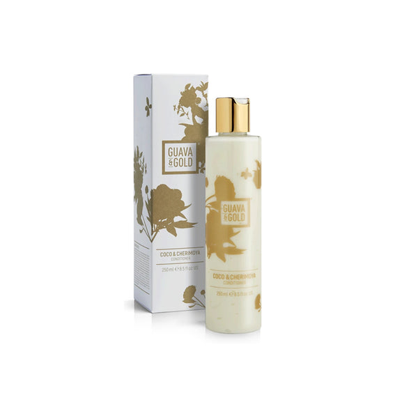 white and gold printed bottle and box of conditioner by Guava and Gold