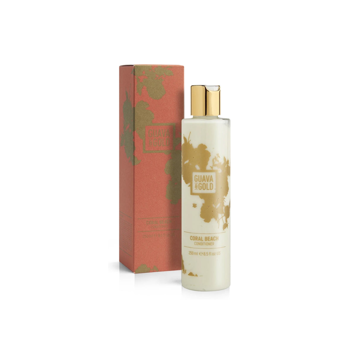 coral and gold printed bottle and box of conditioner by Guava and Gold