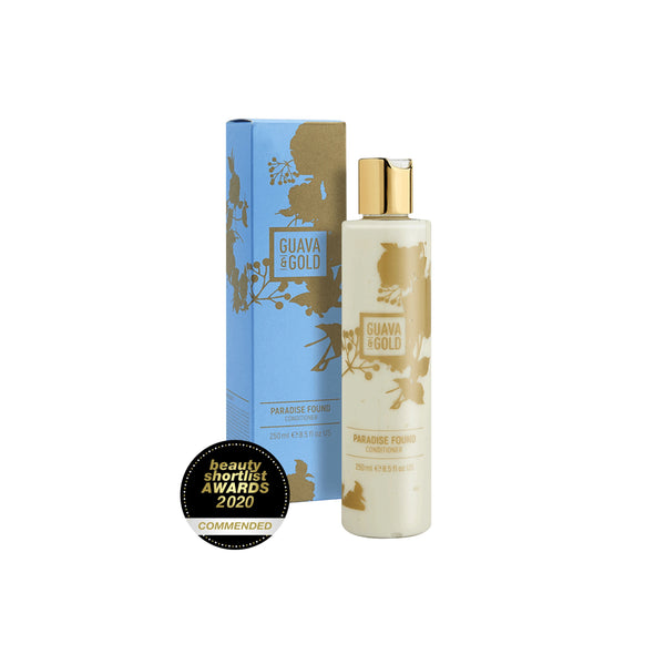 blue and gold printed bottle and box of conditioner by Guava and Gold
