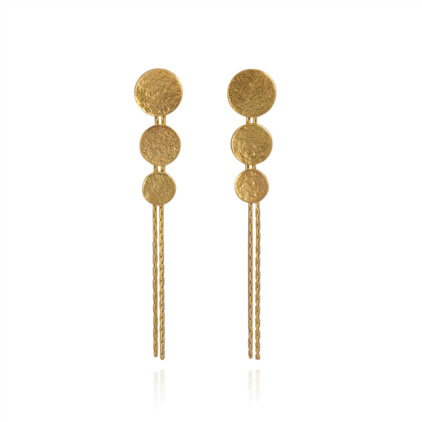 Gold triple disc drop earrings by British jewellery designer Cara Tonkin