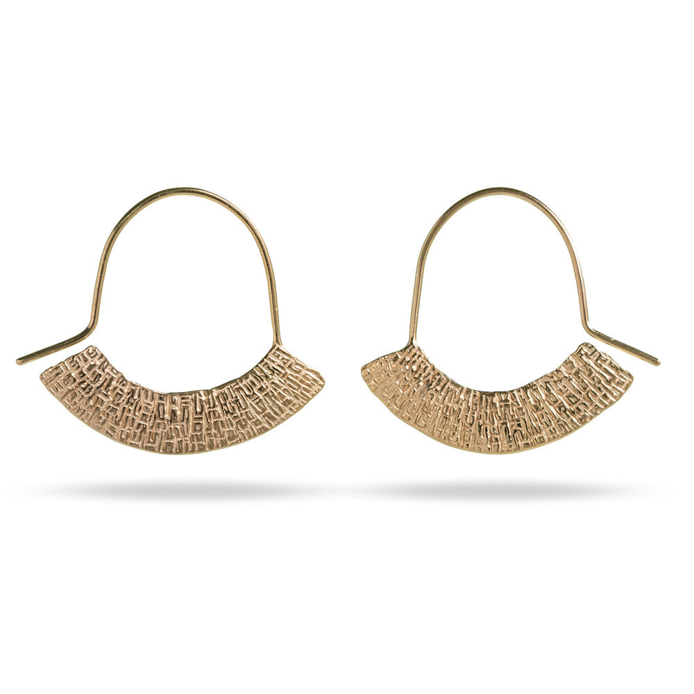 gold embossed arc shaped earrings at IndependentBoutique.com