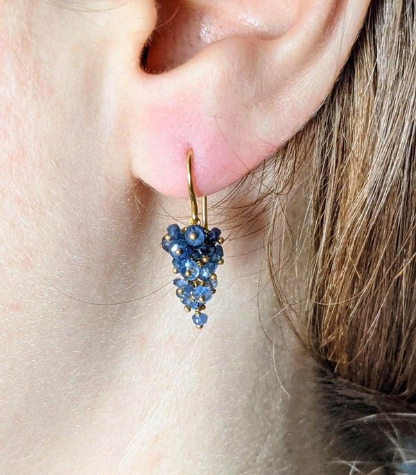 cluster sapphire earrings with gold vermeil on model