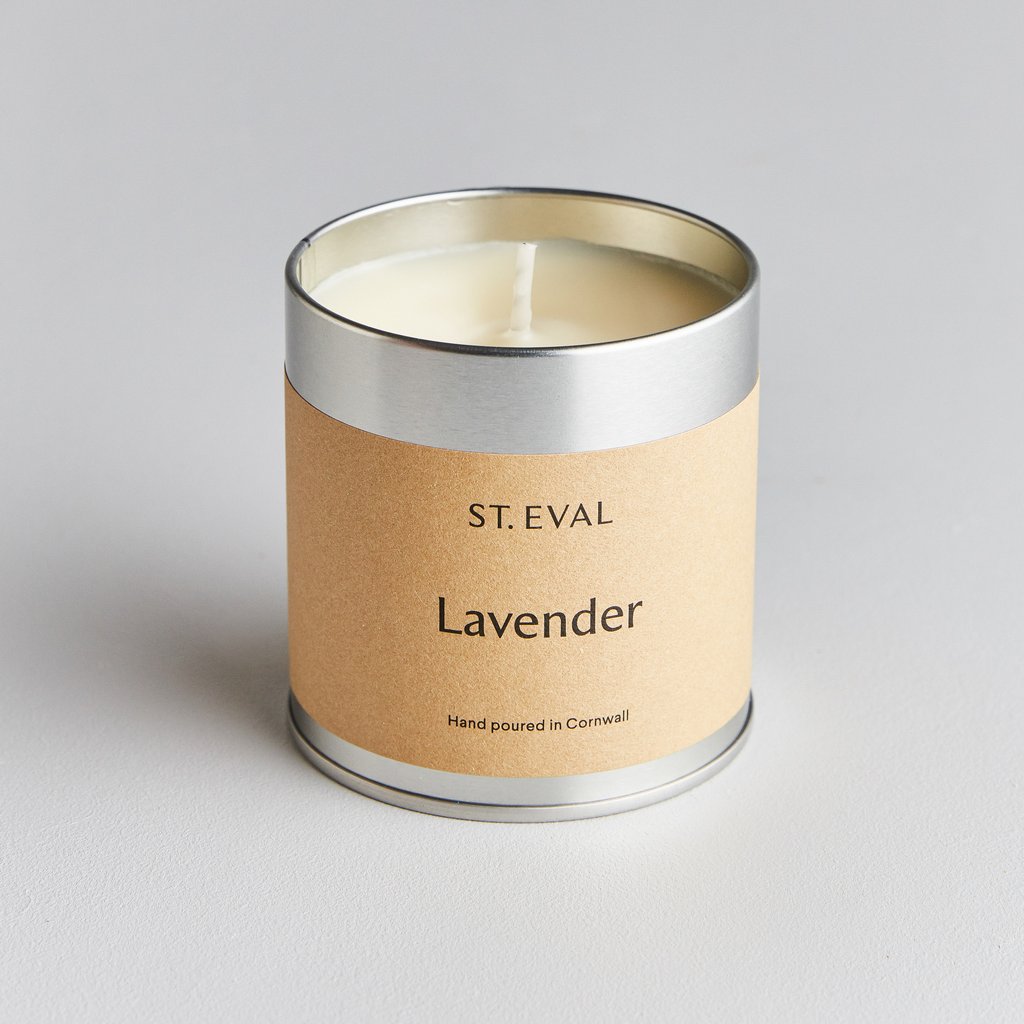 silver tin lavender candle with no lid showing cream candle from st Eval