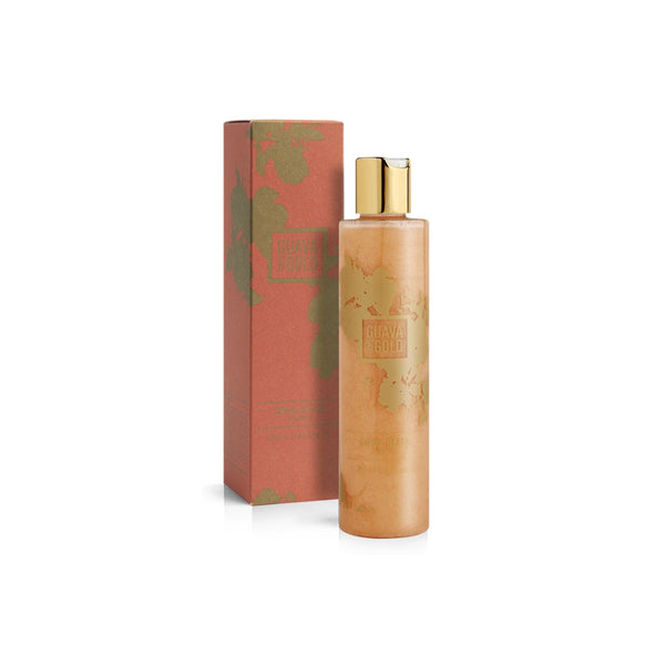 coral and gold printed bottle and box of shampoo by Guava and Gold