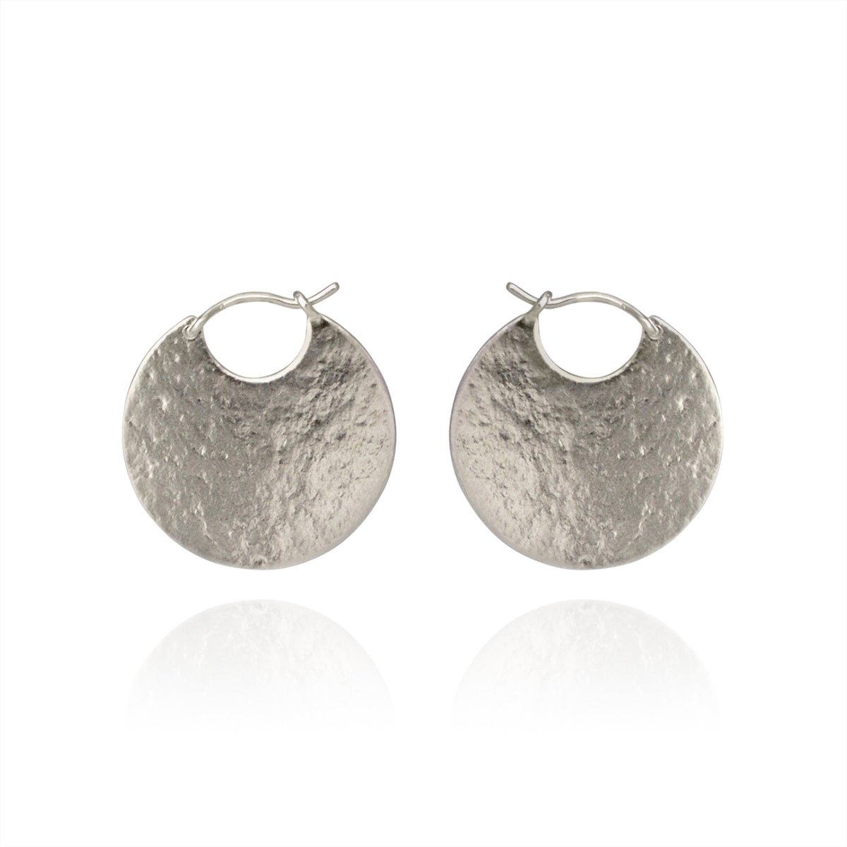 Silver disc hoop textured earrings.