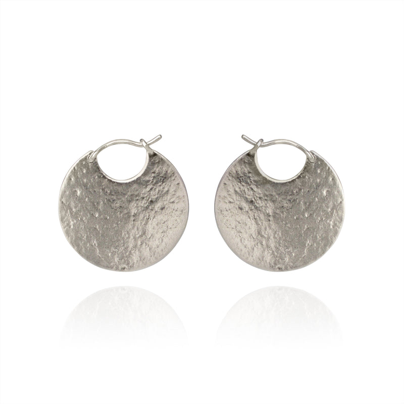 Silver disc hoop textured earrings.