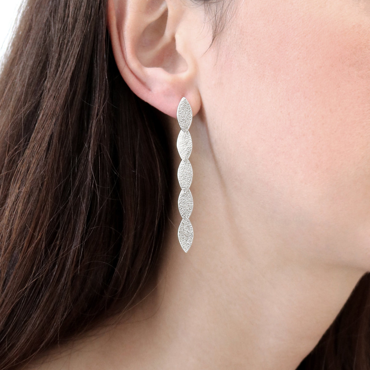 long silver earrings model shot 