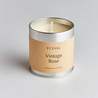 silver tin with new cream candle with no lid in vintage rose by st Eval